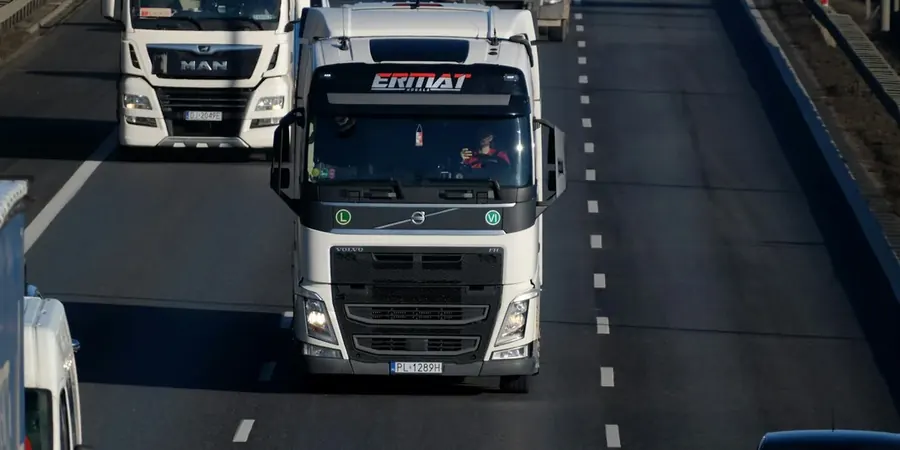Motorway traffic monitored by overhead camera gantries
